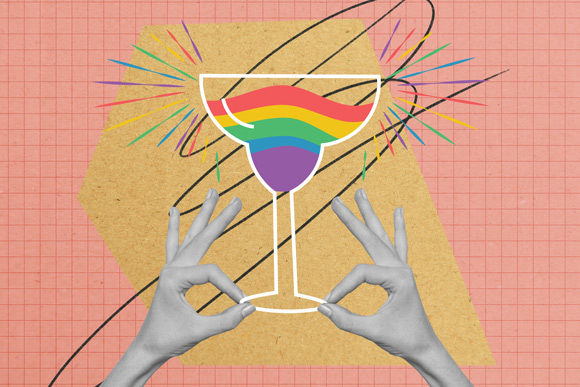 Pride concept, cocktail art being held by hands
